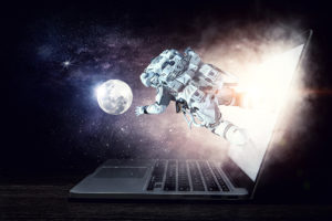A laptop in the dark, with a nebula coming out of the screen. An astronaut floats in the starry void, reaching out toward a moon in the distance.